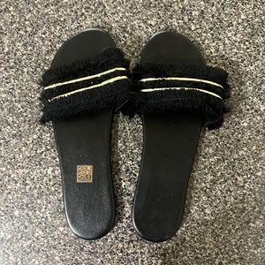 Black and gold sandals